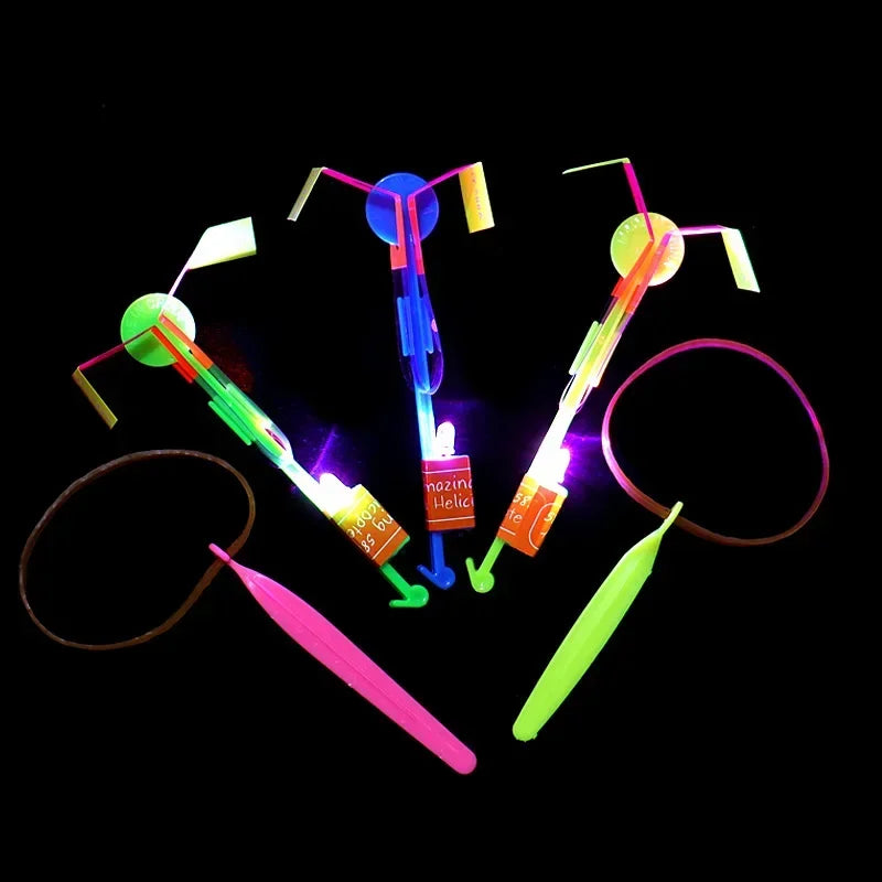 Incrível luz LED, brinquedo de helicóptero voando, luz LED, borracha catapulta, presente divertido, festa, 1, 3, 5, 10, 20, 50, 100pcs
